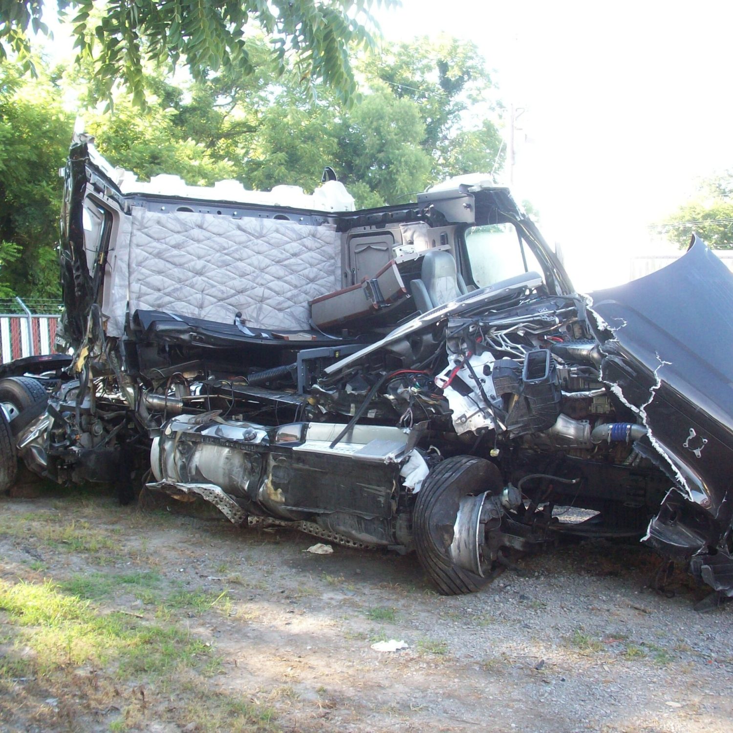 Truck rolled over, tore open and yet the driver was uninjured because he was belted.